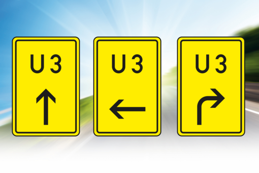 Three yellow diversion signs with arrows.