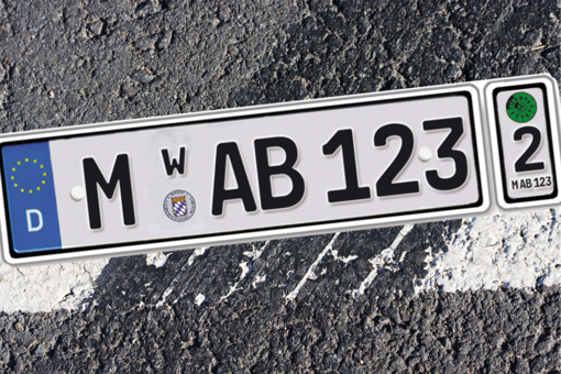 Interchangeable plate number